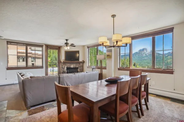 a bathroom with a sink double vanity mirror and a toilet