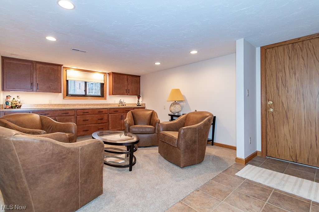 11579 Edgewood Road Chardon, OH 44024 - Photo 12 of 35 This cozy flex space can be used as a bar, game room, office or play room.