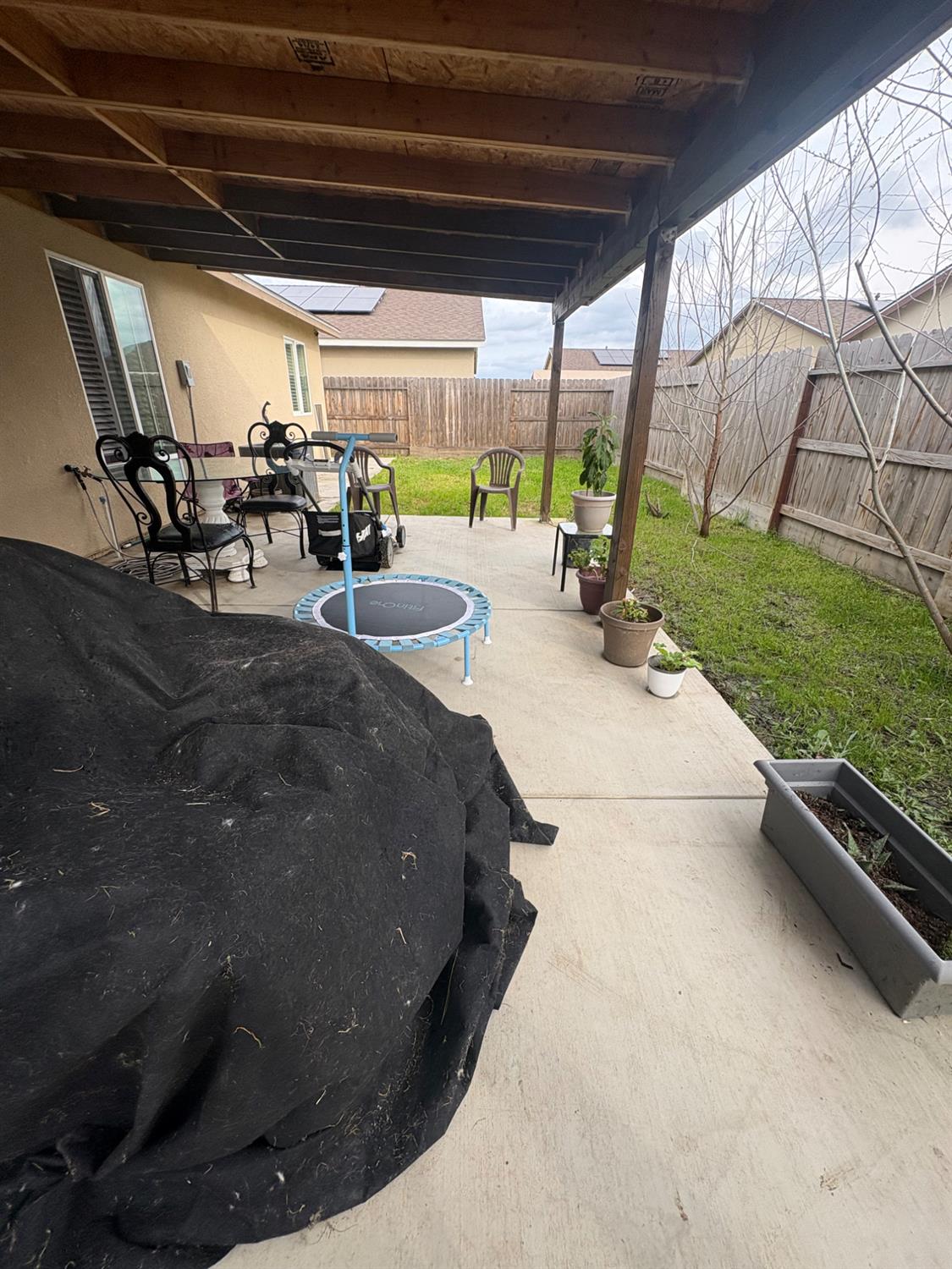 628 Marcus Street Merced, CA 95341 - Photo 21 of 21 Large Covered Patio. Easy Care Backyard