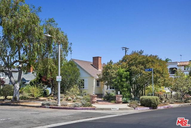 a view of a street with houses