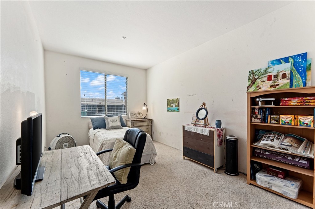 5922 Abernathy Drive Riverside, CA 92507 - Photo 20 of 29 a view of a workspace with furniture and window