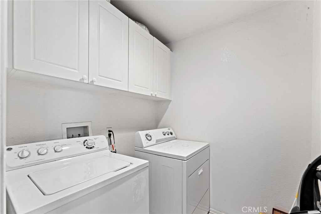 5922 Abernathy Drive Riverside, CA 92507 - Photo 21 of 29 a utility room with dryer and washer