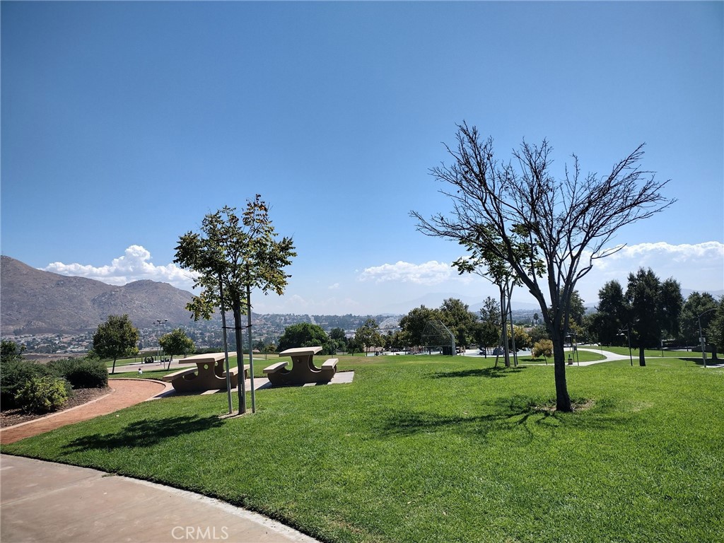 5922 Abernathy Drive Riverside, CA 92507 - Photo 25 of 29 a view of a park with trees and cars