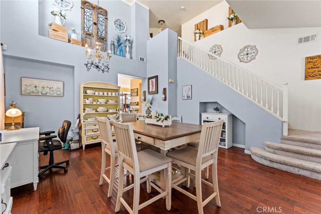 5922 Abernathy Drive Riverside, CA 92507 - Photo 6 of 29 a view of a dining room with furniture and wooden floor