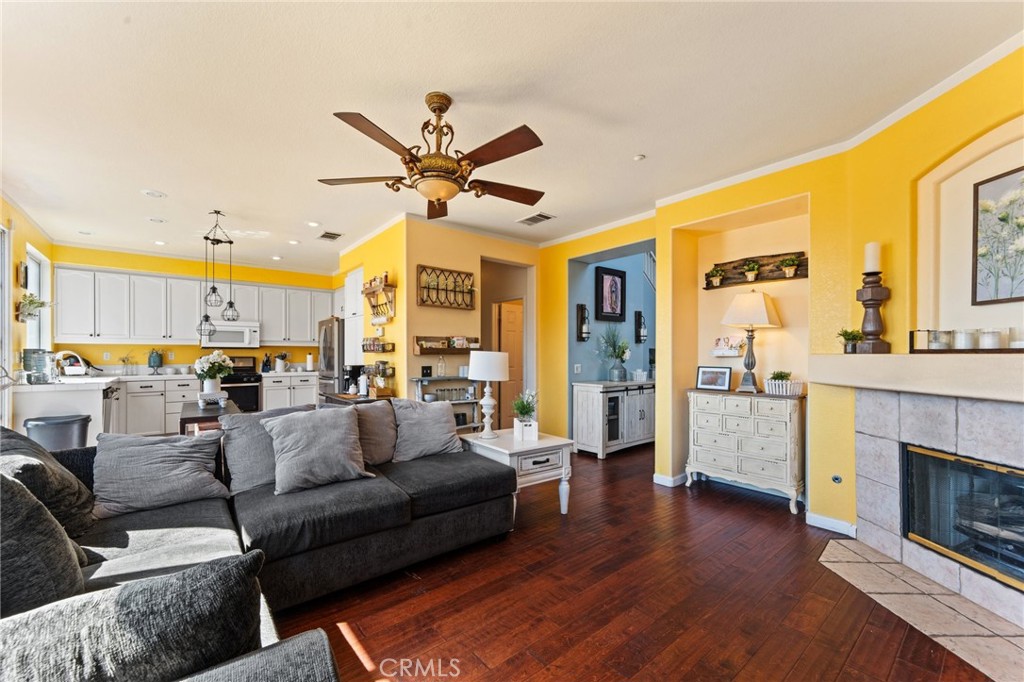5922 Abernathy Drive Riverside, CA 92507 - Photo 9 of 29 a living room with furniture and a fireplace