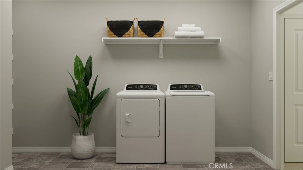 369 Deer Lane Way Perris, CA 92570 - Photo 12 of 15 a view of storage and utility room with washer and dryer