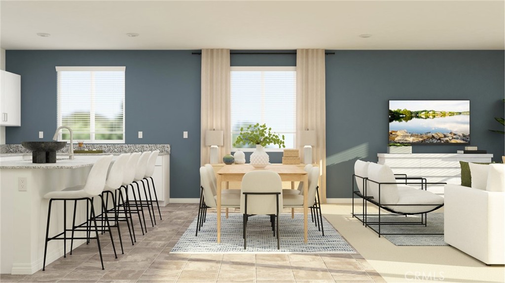 369 Deer Lane Way Perris, CA 92570 - Photo 3 of 15 a dining room with furniture a rug and wooden floor