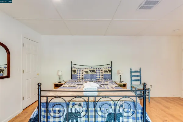 a view of a patio with table and chairs