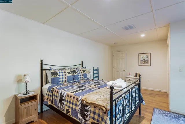 a view of a house with a snow in the background