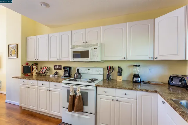 a bedroom with bed and a window