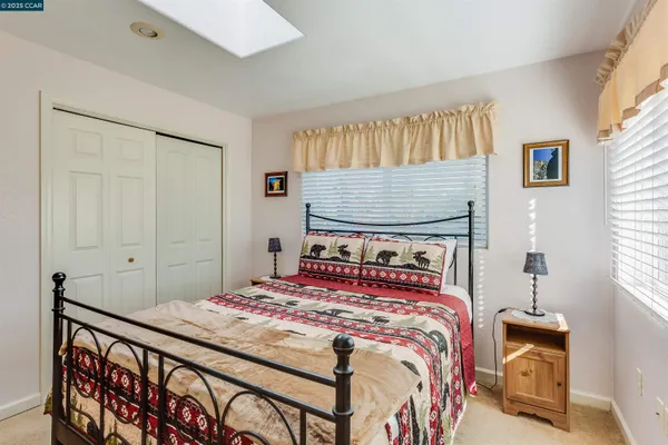 a view of storage and utility room with washer and dryer