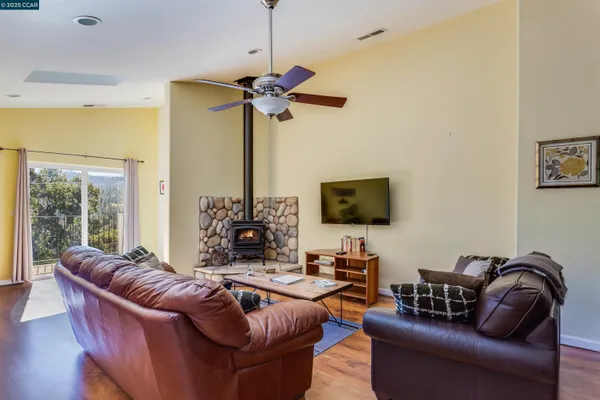 a bedroom with two beds and a window