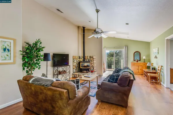 a bedroom with two beds and a dresser