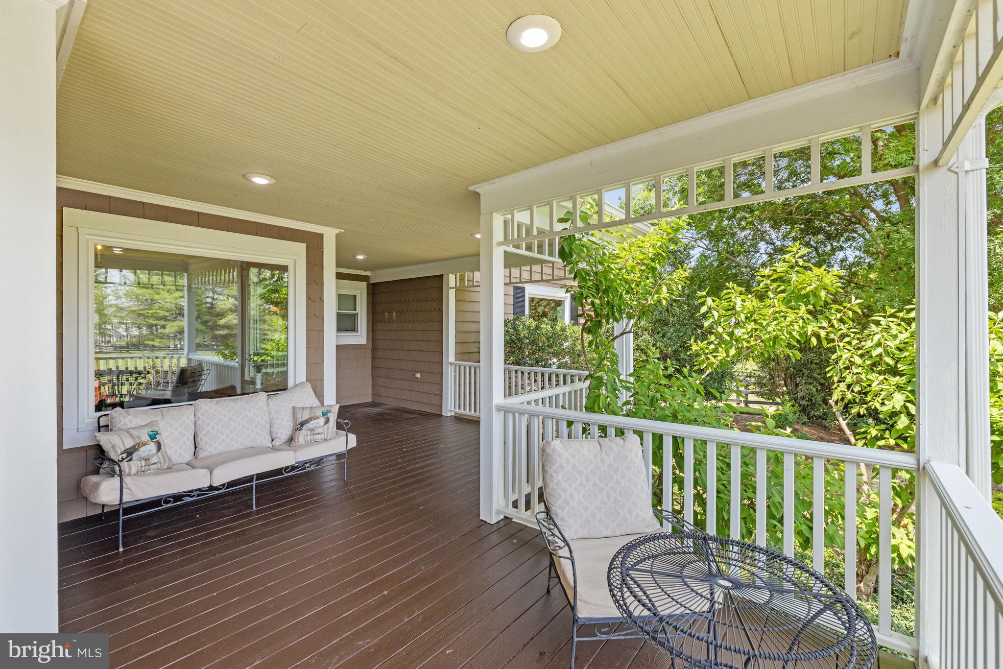 19967 Telegraph Springs Road Purcellville, VA 20132 - Photo 11 of 58 Front Porch has several sitting areas