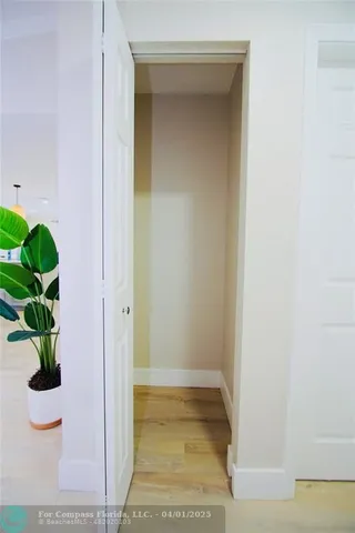 a view of bathroom with a potted plant