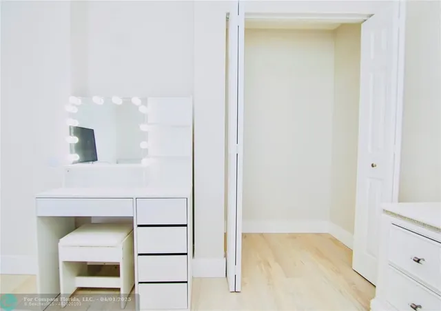 a view of staircase with white walls