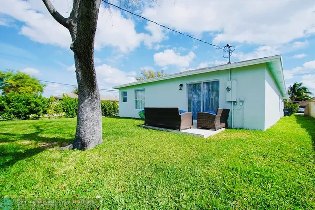 a house view with a garden space