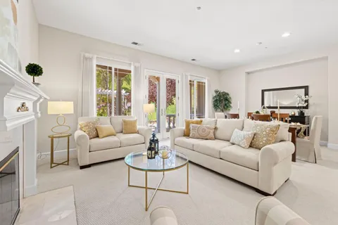 a view of a dining room with furniture window and flowerpot