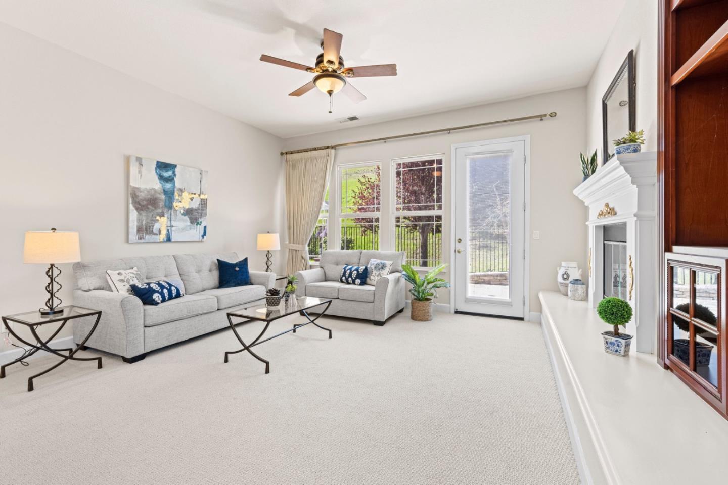 7071 Eagle Ridge Drive Gilroy, CA 95020 - Photo 27 of 72 a living room with furniture and a flat screen tv