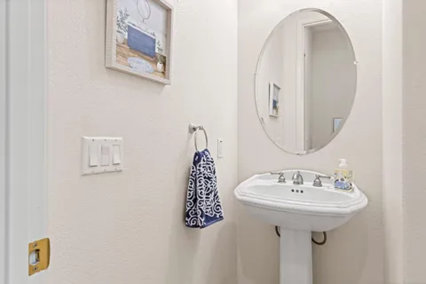 a bathroom with a double vanity sink mirror and double