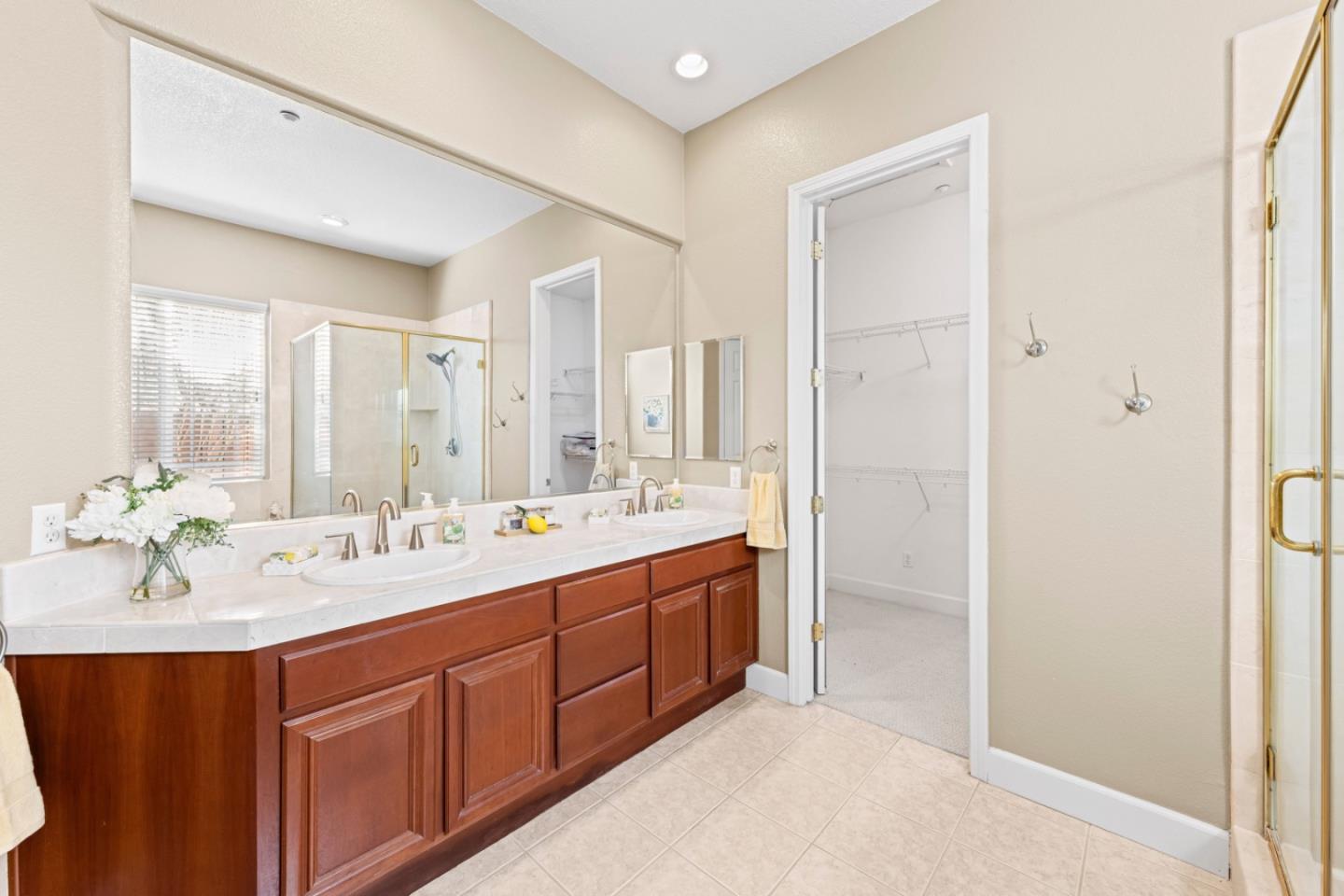 7071 Eagle Ridge Drive Gilroy, CA 95020 - Photo 37 of 72 a bathroom with a double vanity sink mirror and double