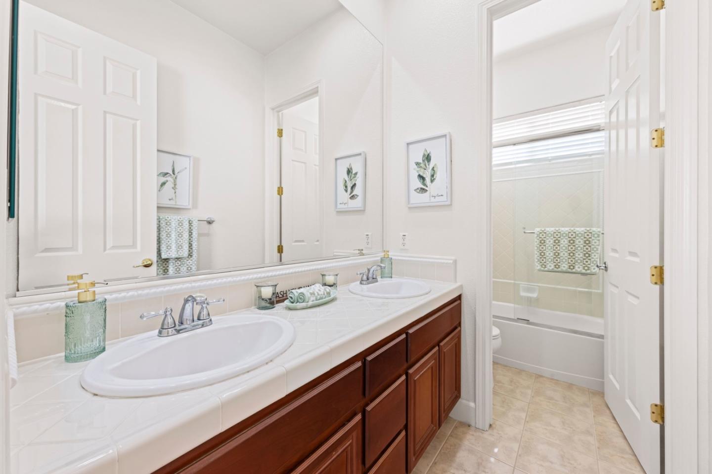 7071 Eagle Ridge Drive Gilroy, CA 95020 - Photo 41 of 72 a bathroom with a sink a toilet and a mirror