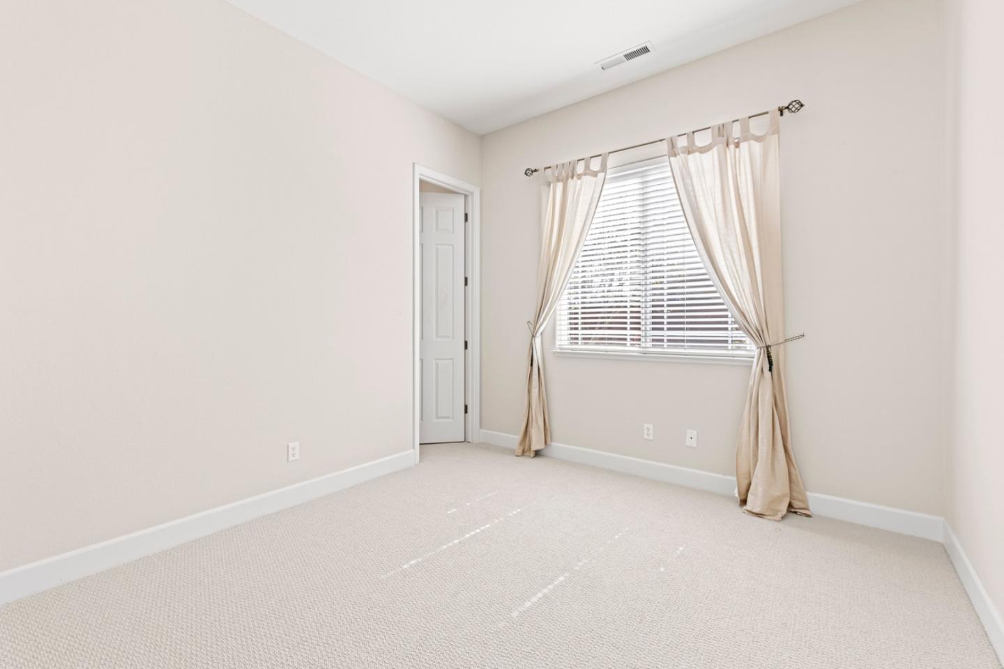 7071 Eagle Ridge Drive Gilroy, CA 95020 - Photo 42 of 72 an empty room with windows