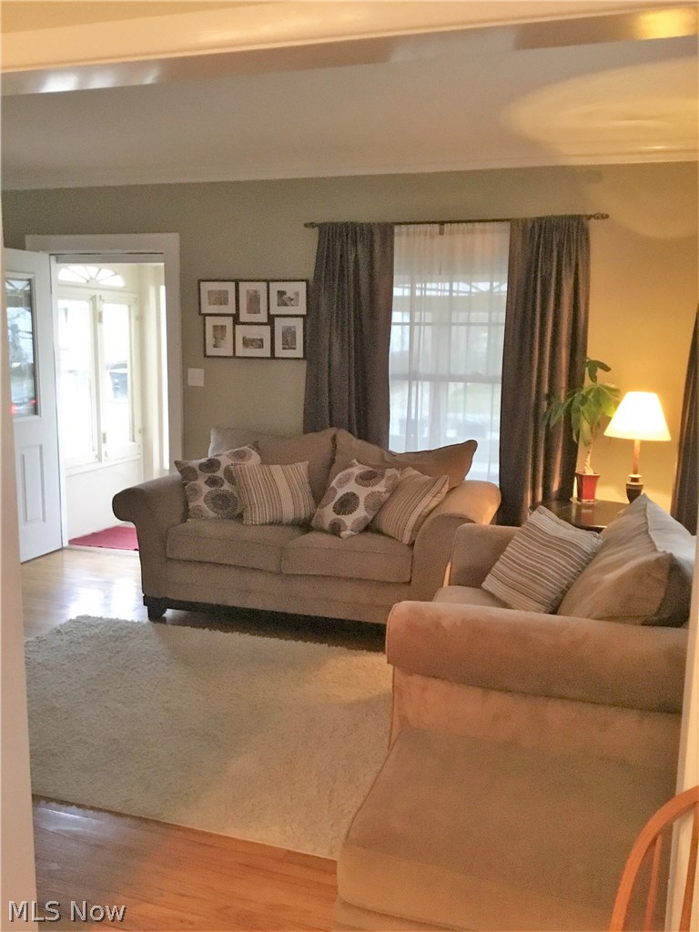 1359 Irene Road Lyndhurst, OH 44124 - Photo 2 of 32 Come in, our formal living room is just perfect for long talks with friends or a cup of coffee in front of the fire curled up with your favorite book.