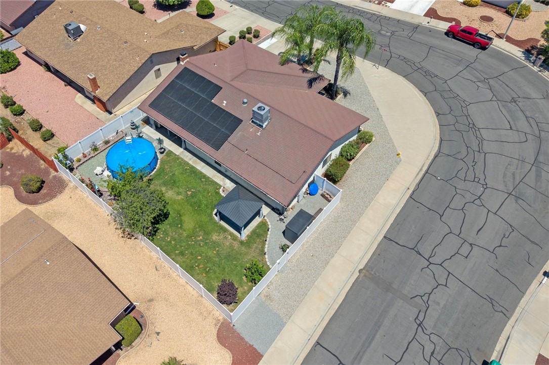 27879 Foxfire Street Menifee, CA 92586 - Photo 6 of 36 an aerial view of a house with a swimming pool