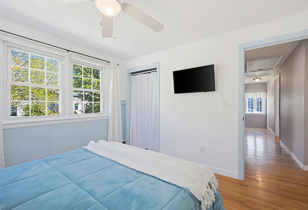 18 Anchorage Road Franklin, MA 02038 - Photo 30 of 42 a bedroom with a bed and a flat screen tv