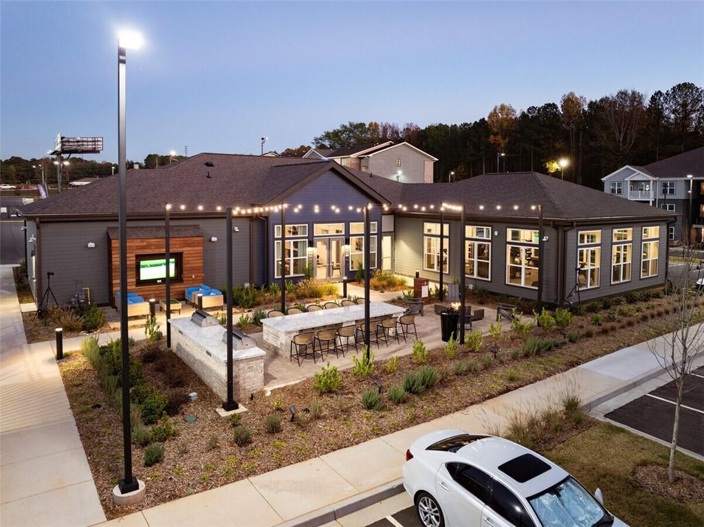 191 Commerce Drive, Unit B1 Villa Rica, GA 30180 - Photo 27 of 30 a view of a house with backyard porch and sitting area