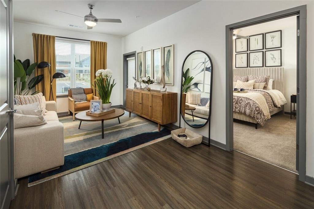 191 Commerce Drive, Unit B1 Villa Rica, GA 30180 - Photo 5 of 30 a bed room with a bed and a large window