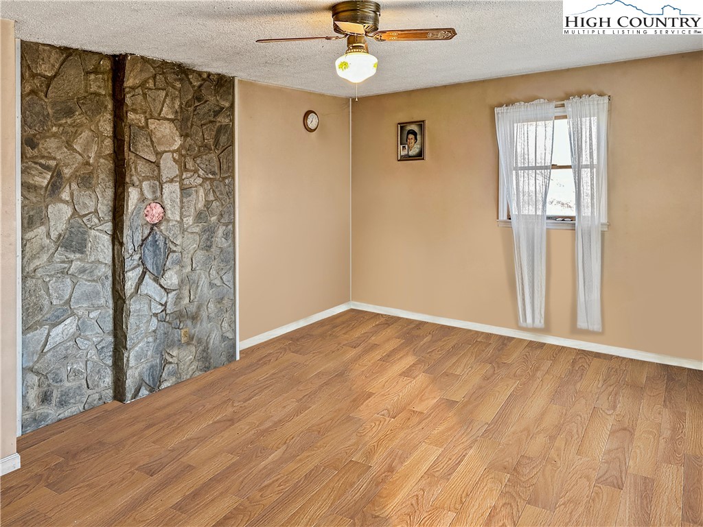 2496 Tucker Road Lansing, NC 28643 - Photo 13 of 20 a view of an empty room with a window