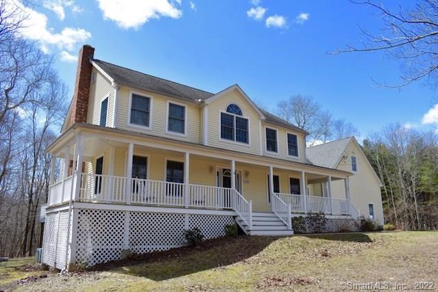 282 Burnt Hill Road Hebron, CT 06248 - Photo 1 of 1 a front view of a house with a yard