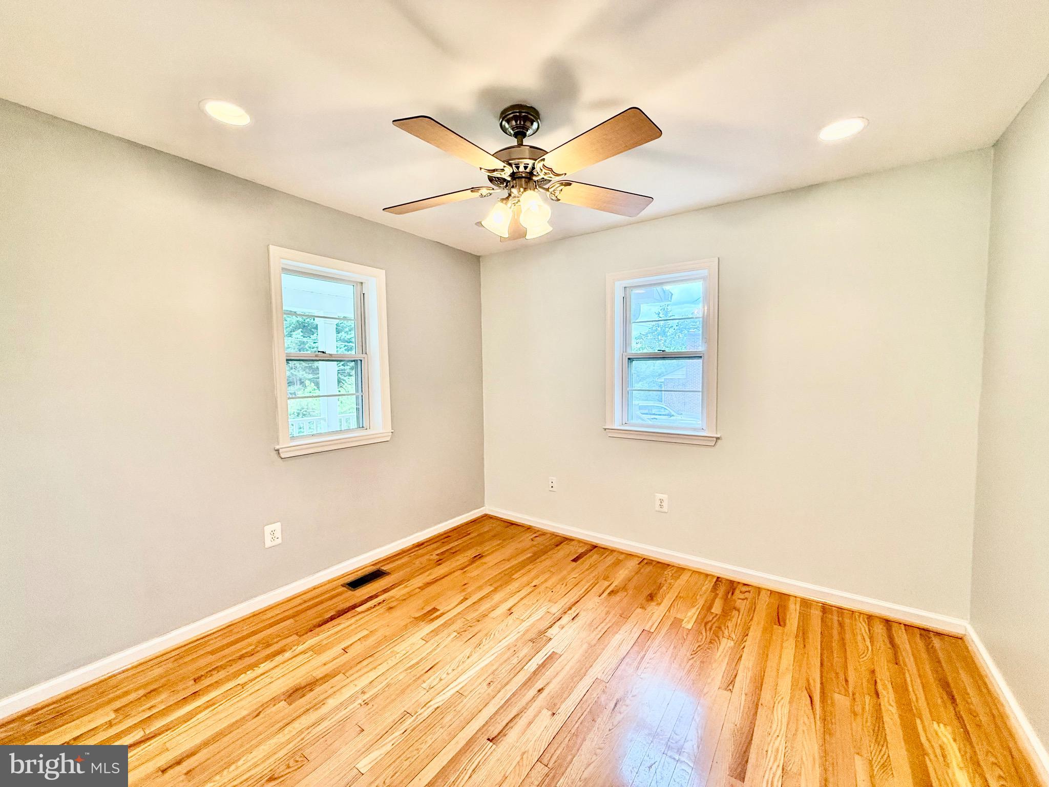 6605 Keene Drive Springfield, VA 22152 - Photo 112 of 127 a view of a room with a ceiling fan and a window