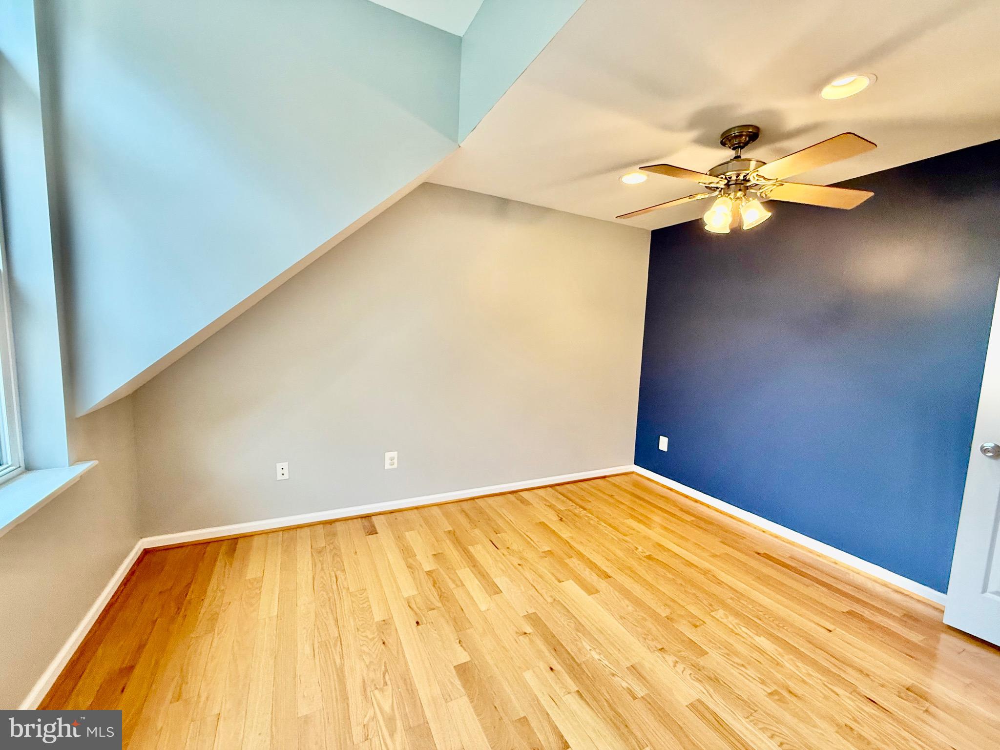6605 Keene Drive Springfield, VA 22152 - Photo 96 of 127 a view of a big room with wooden floor and windows