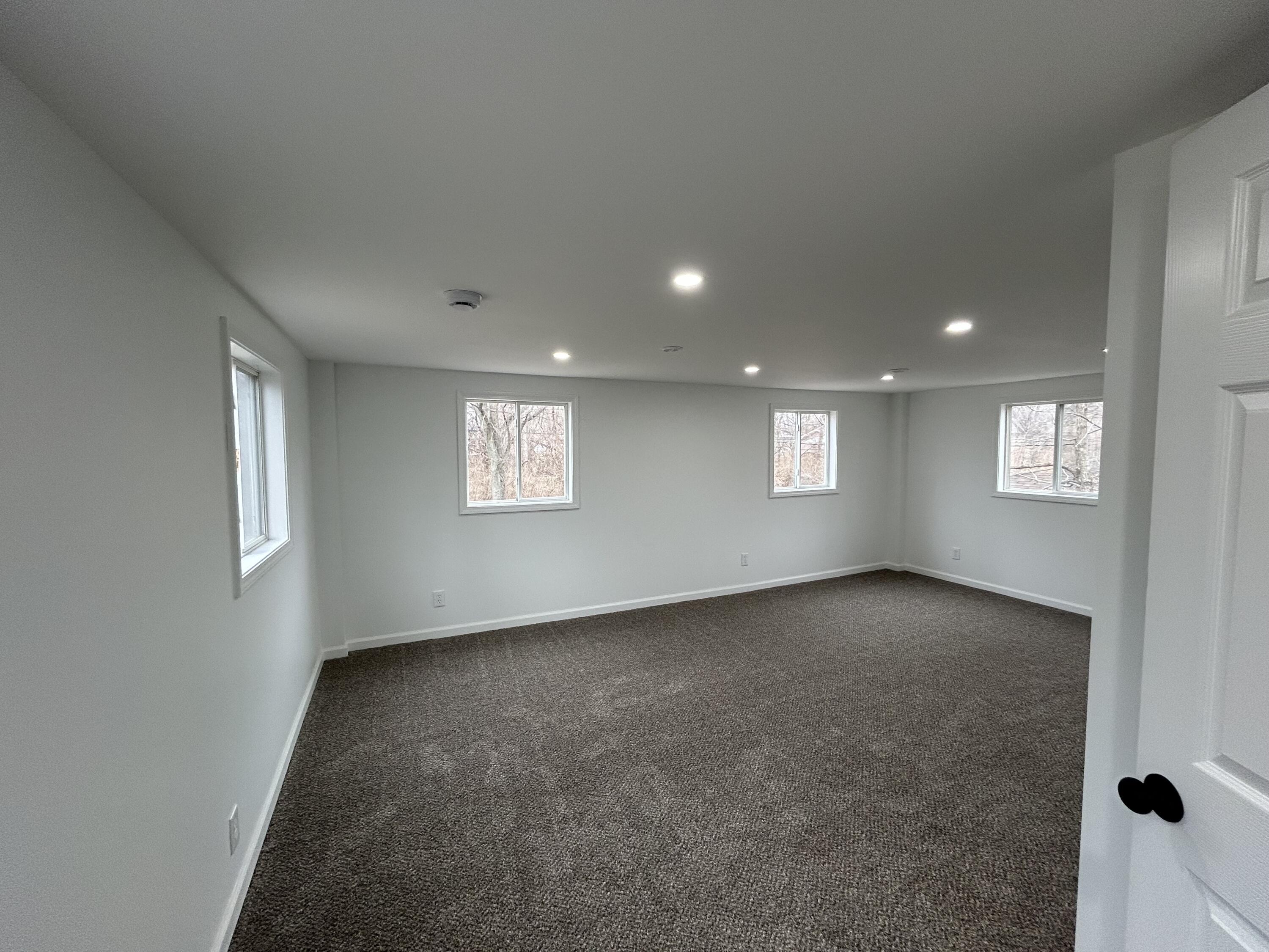 6701 Madison Street Merrillville, IN 46410 - Photo 12 of 25 a view of an empty room with a window