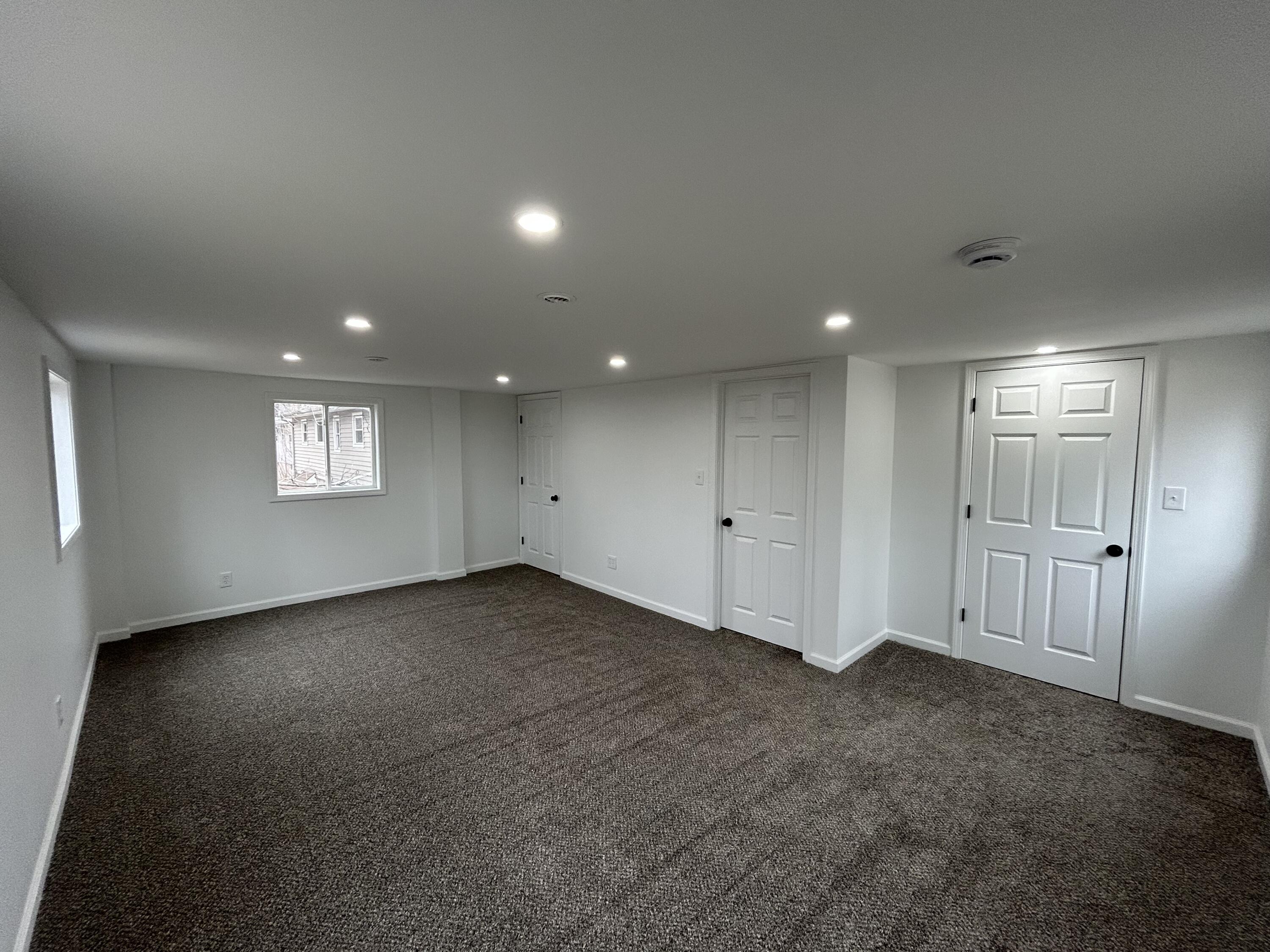 6701 Madison Street Merrillville, IN 46410 - Photo 13 of 25 a view of an empty room and a window
