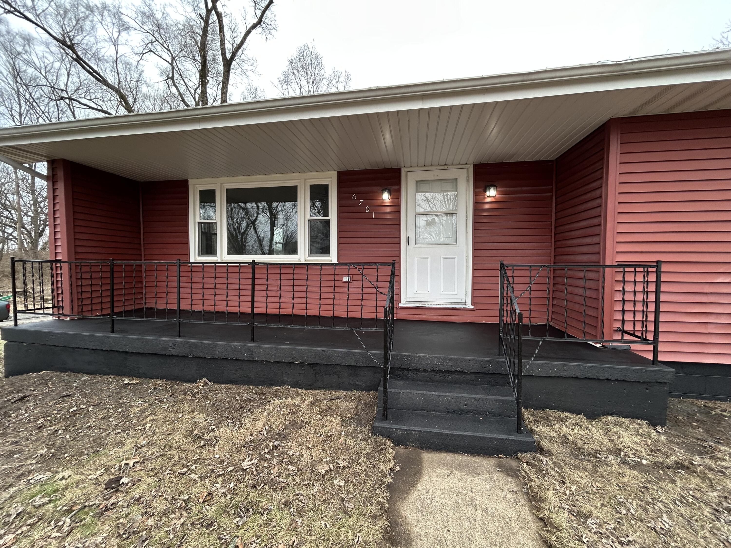 6701 Madison Street Merrillville, IN 46410 - Photo 24 of 25 a front view of a house