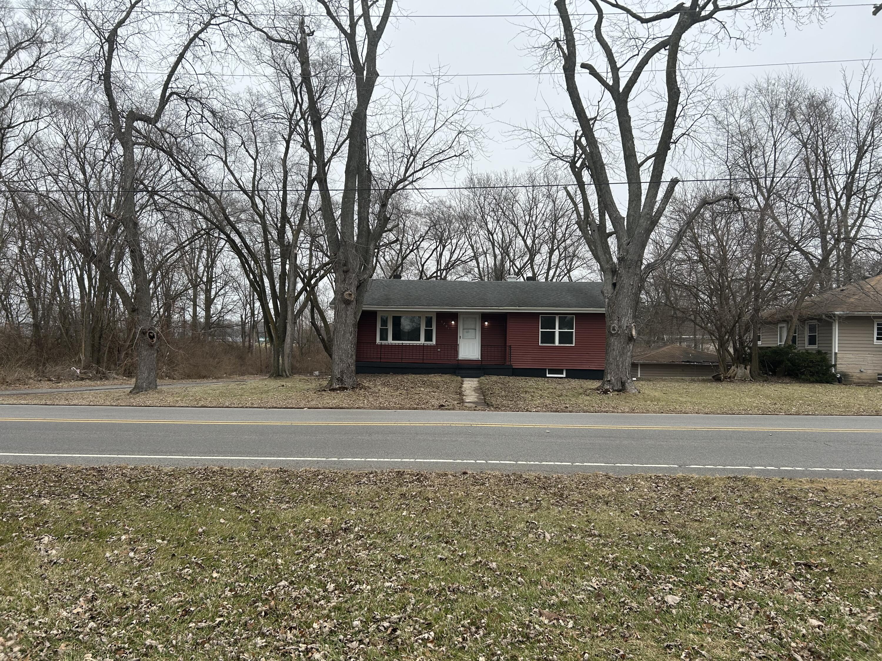 6701 Madison Street Merrillville, IN 46410 - Photo 25 of 25 a view of a house with a yard