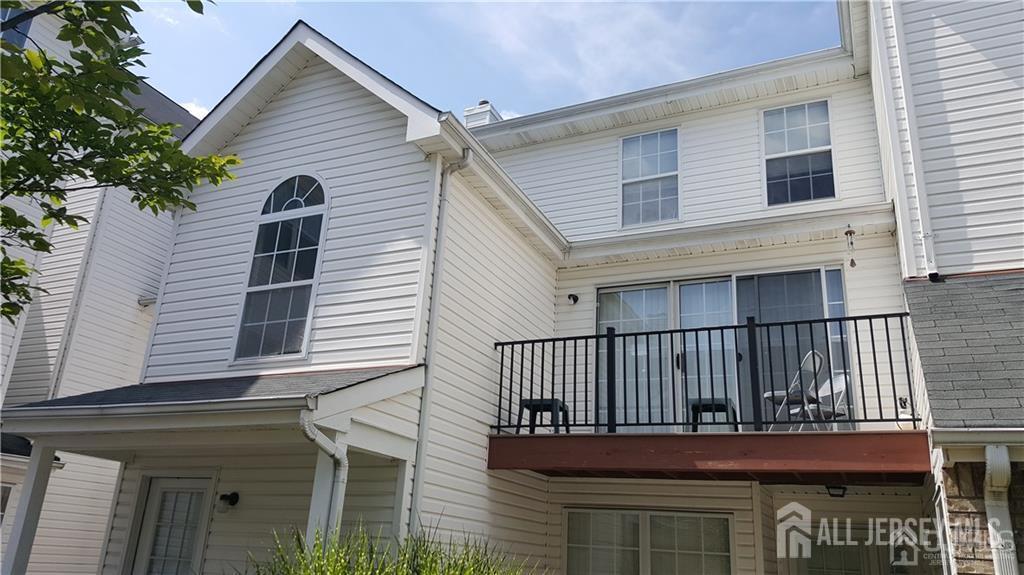813 Plymouth Road North Brunswick, NJ 08902 - Photo 2 of 14 a view of a house with wooden fence