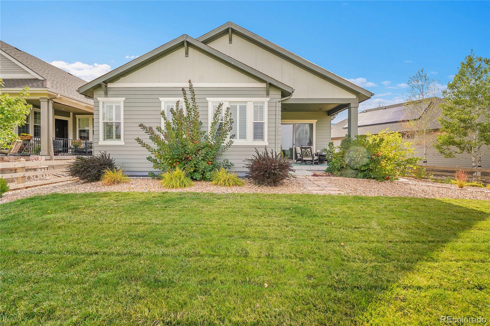 3429 Goodyear Street Castle Rock, CO 80109 - Photo 26 of 32 a view of a house with a yard