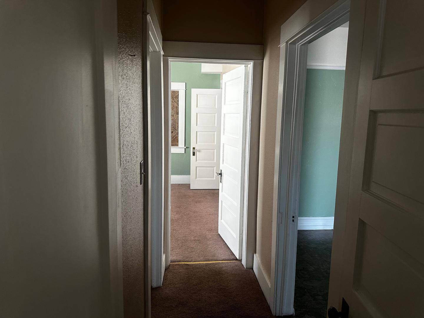 703 East 13th Street Douglas, AZ 85607 - Photo 11 of 16 a view of a bathroom from a hallway