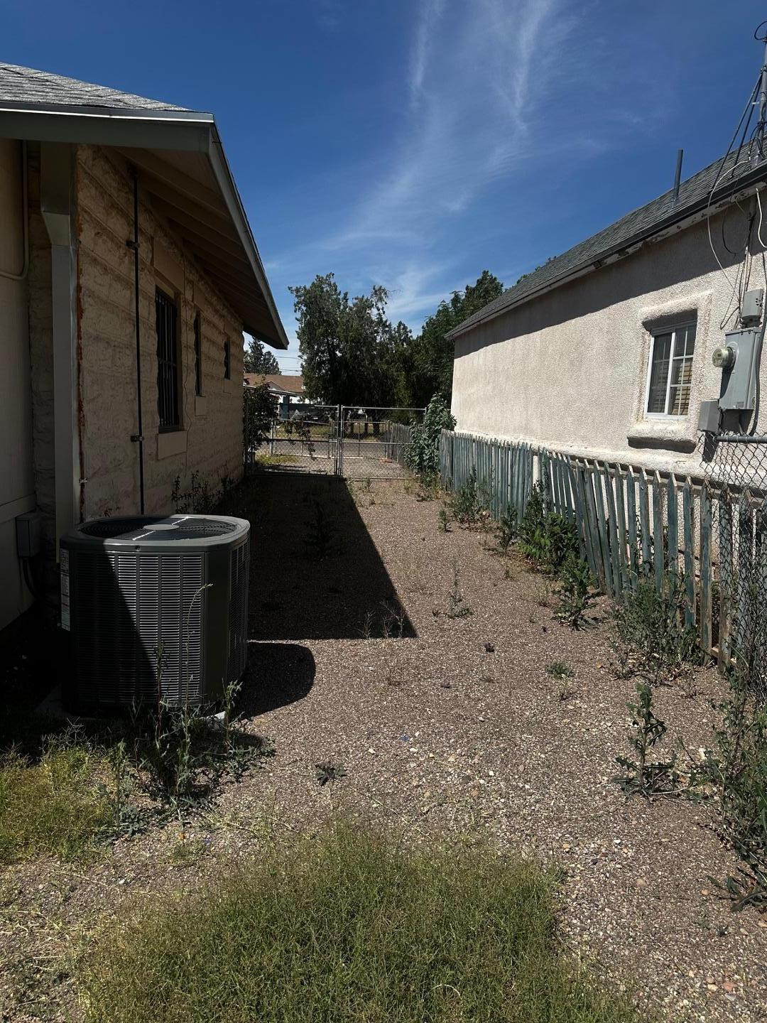 703 East 13th Street Douglas, AZ 85607 - Photo 16 of 16 a view of backyard with barbeque grill and wooden fence
