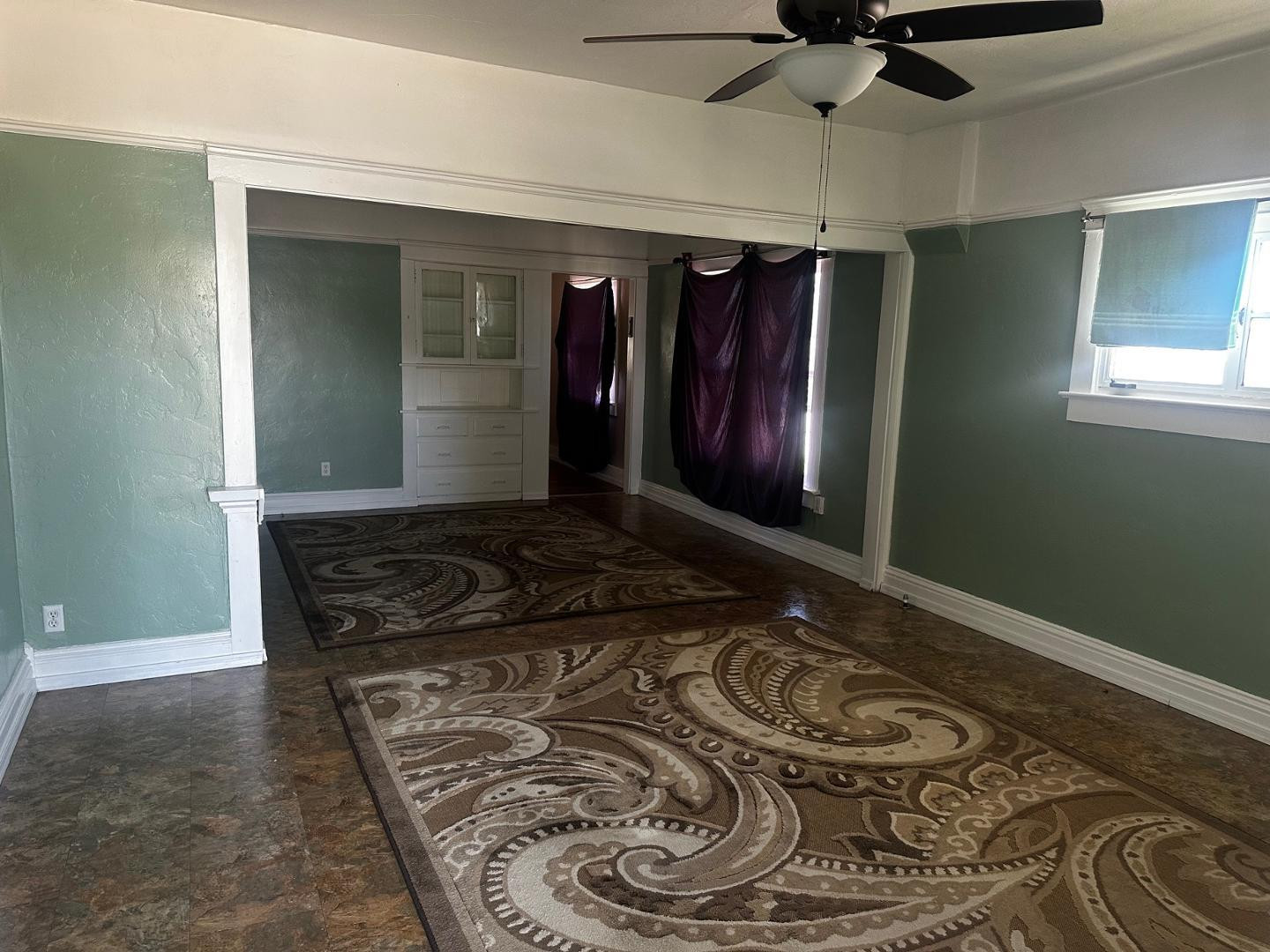 703 East 13th Street Douglas, AZ 85607 - Photo 2 of 16 a living room with a couch and a window