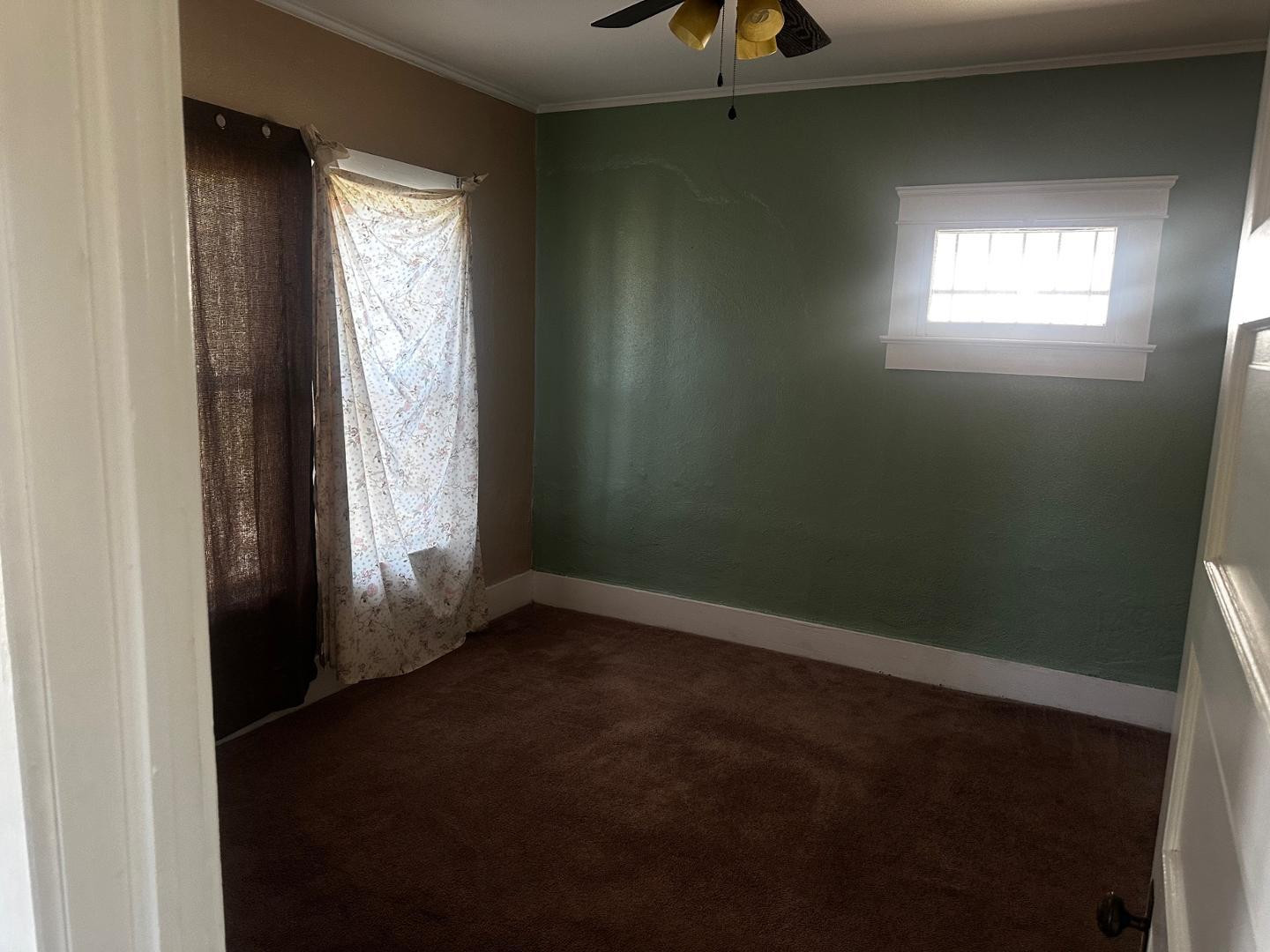 703 East 13th Street Douglas, AZ 85607 - Photo 9 of 16 an empty room with a window