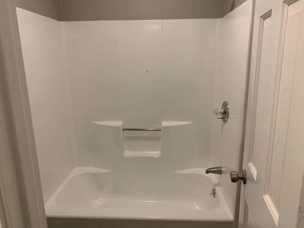 846 Idlewood Road Winder, GA 30680 - Photo 21 of 27 a close view of a bathtub in bathroom