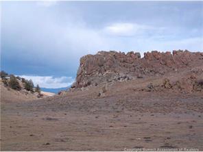 42 Delaware Road Hartsel, CO 80449 - Photo 5 of 16 a view of beach and mountain in the background
