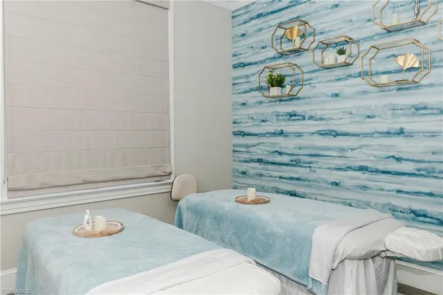 a bathroom with a bathtub and sink