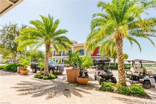 a group of cars parked in front of building
